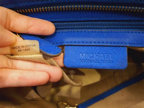 pics of real and fake mk bags|michael kors serial number.